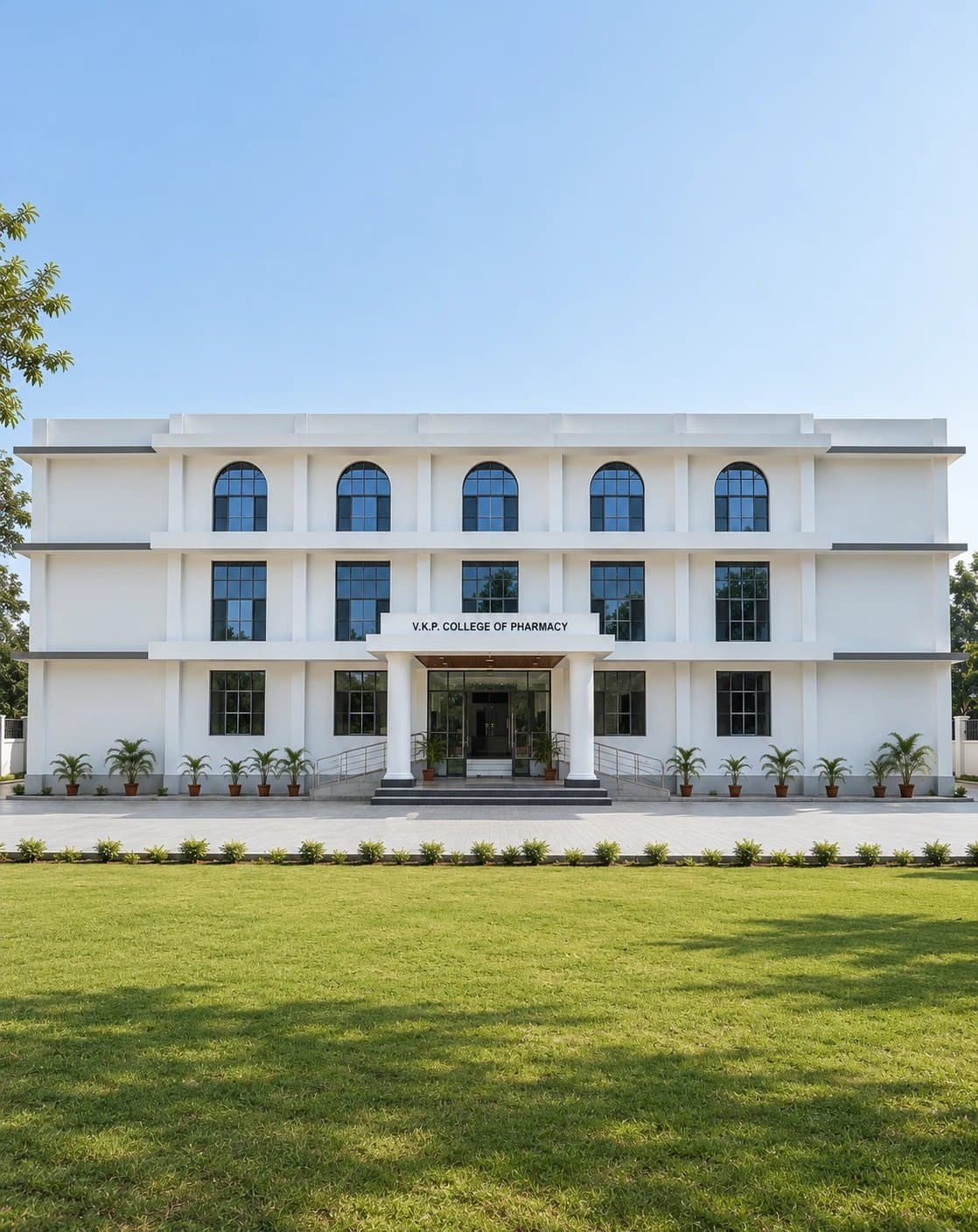 Front of the white college building with arched windows, facing a wide lawn