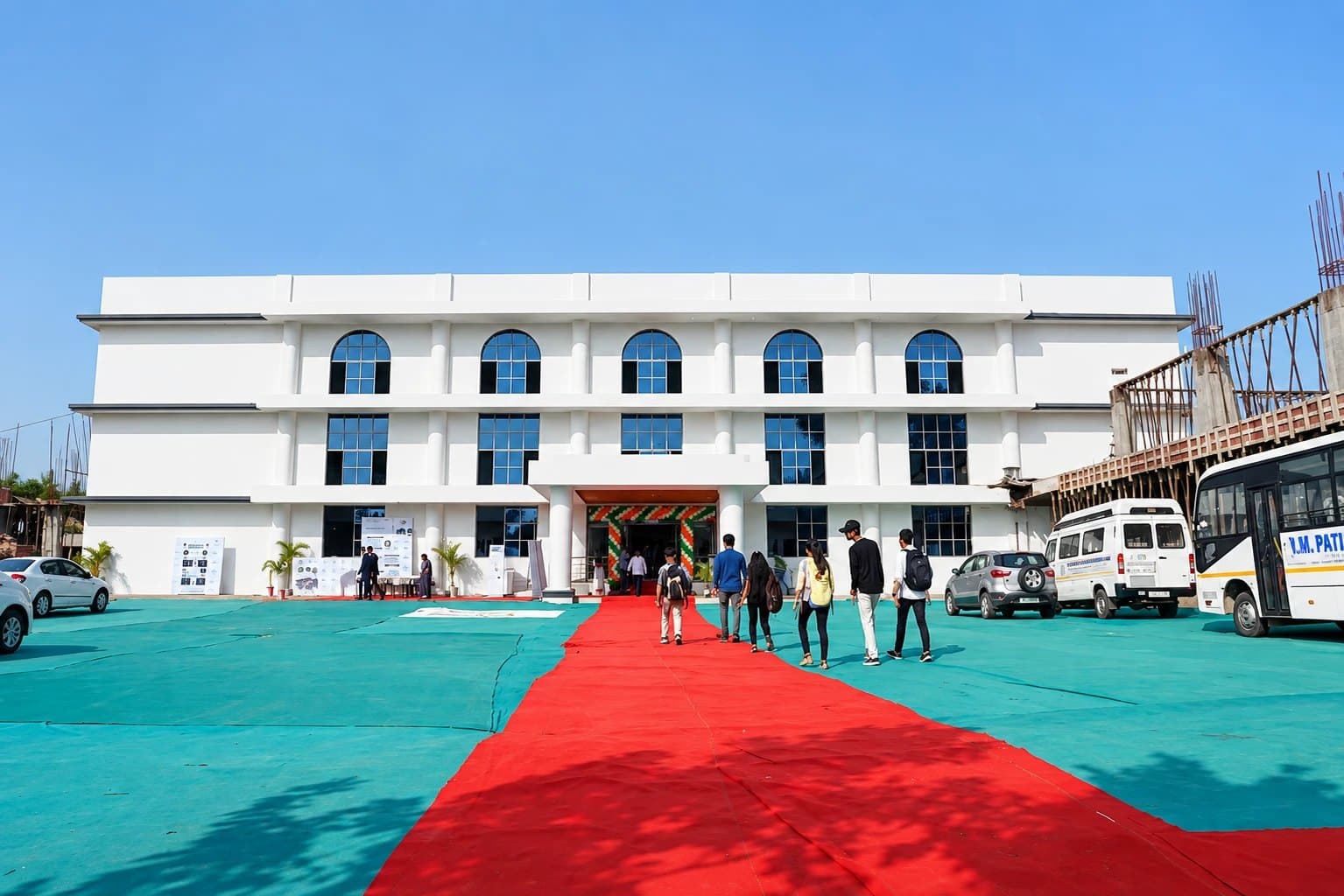 Students walking up to the main VMPKP college building at Asangaon