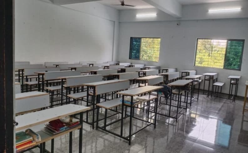 A classroom with rows of desks at the hospitality college