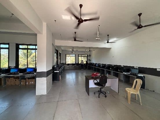 Computers along the walls of the computer lab