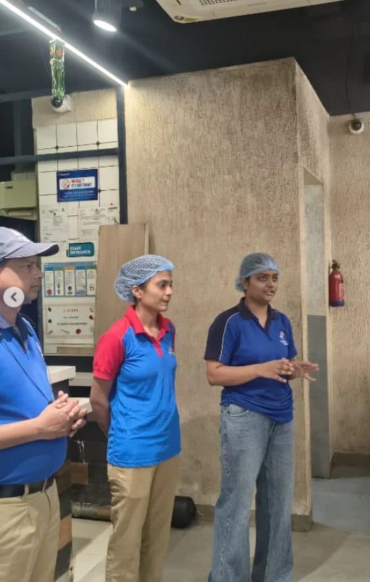 Domino’s staff speaking to students during the industrial visit