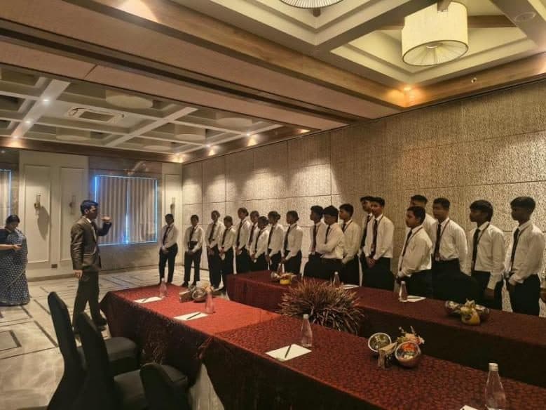 Students being shown a banquet room during the industrial visit to The Fern Shelter Resort