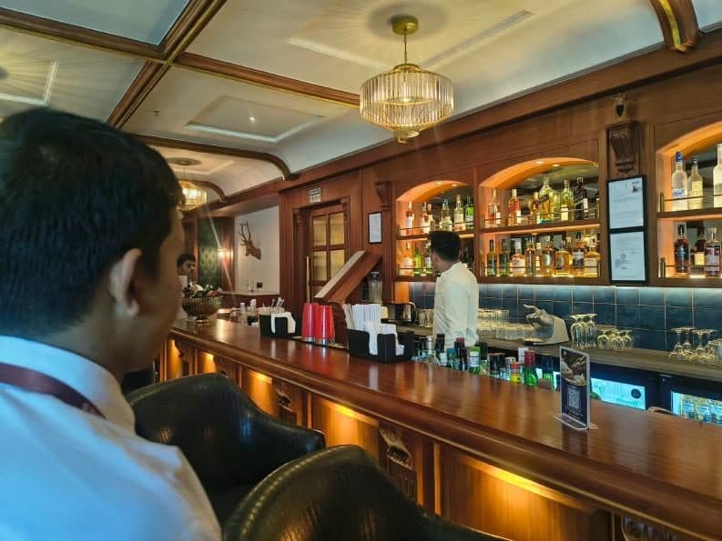 Students at the bar counter during the industrial visit to The Fern Shelter Resort