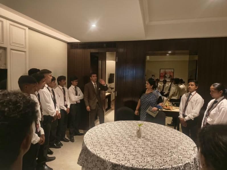 Students in a dining area during the industrial visit to The Fern Shelter Resort
