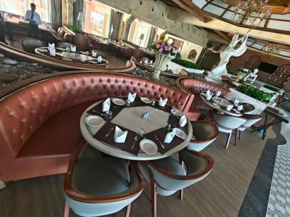 Restaurant seating at the Lemon Tree hotel visited by students